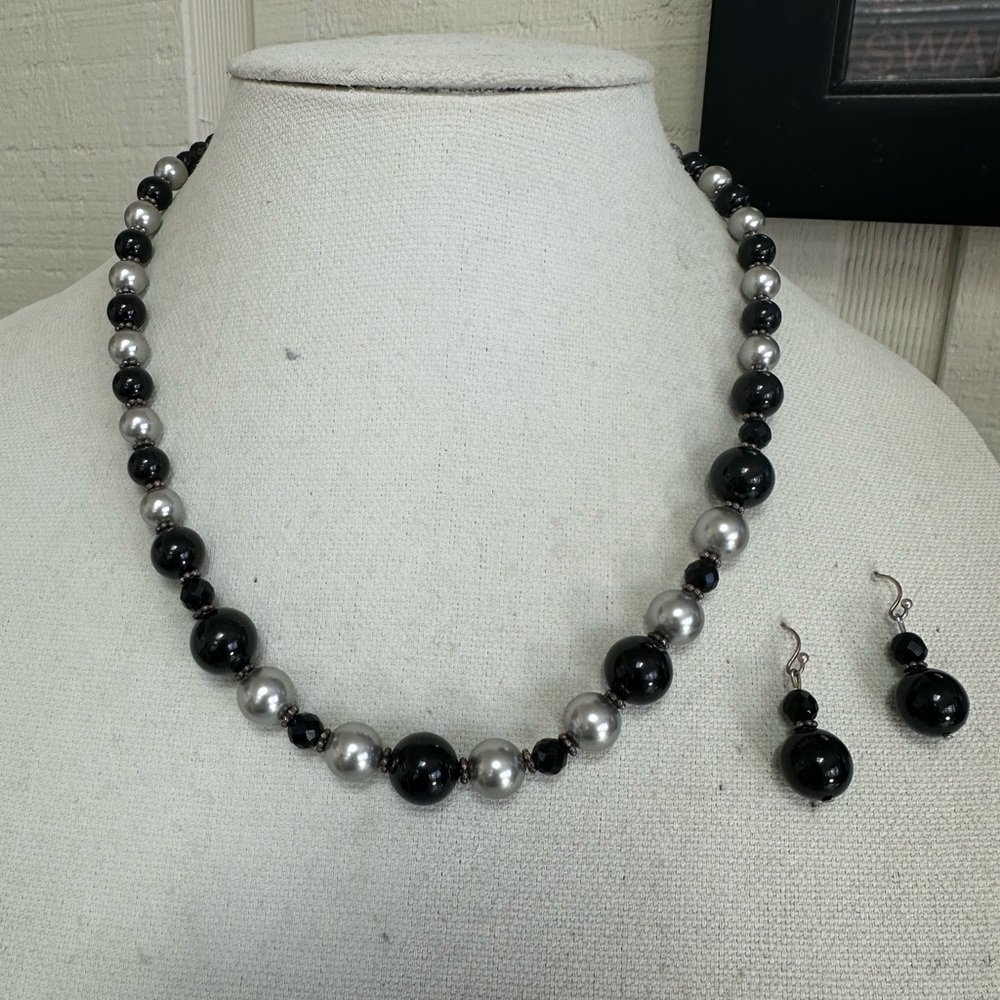 Black and silvertone glass bead necklace with earrings